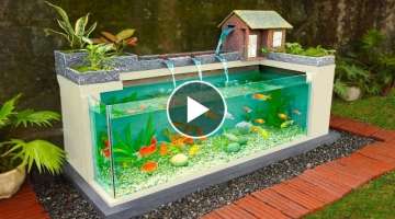 My Dad builds amazing waterfall aquarium for our empty garden